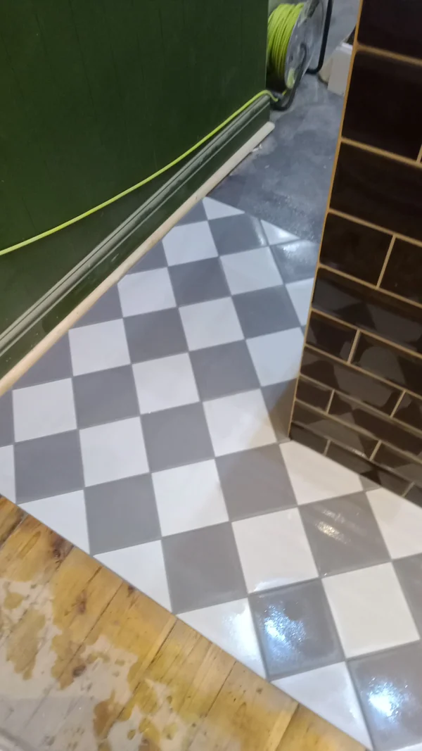 Chequer hall floor — Set on point, green metro riser